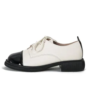 Chique beige en zwarte derby schoenen met dikke rubberen zool voor dames