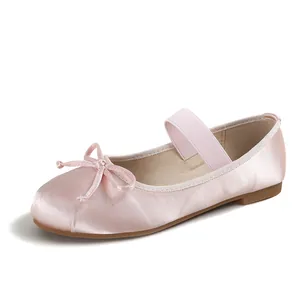 Pink satin Mary Jane ballet flats for girls with bow detail and elastic strap