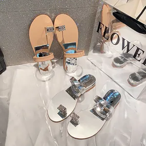 Flat thong sandals for women with square rhinestone buckle and silver mirrored footbed