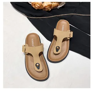 Chic khaki leather thong sandals with gold buckle detail and thick fashion platform sole