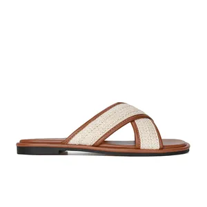 Damen Sandalen flach mit beigen geflochtenen Kreuzgurten und braunen Lederkanten