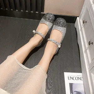 Sparkly black and silver Mary Jane flats with pearl buckle and metal chain straps