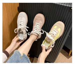 Three color variants of leather sneakers shown in a stylish travel setting with a suitcase