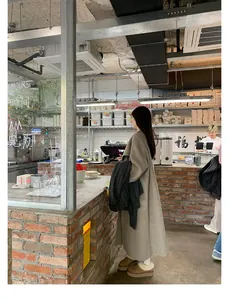 Winter casual style with oat gray oversized long wool coat and plush snow boots