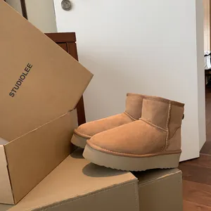 Classic chestnut suede platform snow boots for women with warm wool lining and rubber sole