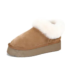 Stivali da neve classici in pelle color castagna con suola platform e lana