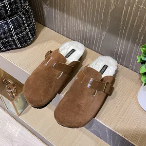 Brown suede faux fur lined Boston clogs with adjustable metal buckle and warm interior