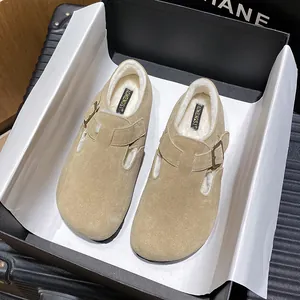 Suede leather shearling lined clog with metal buckle in a stylish premium gift box