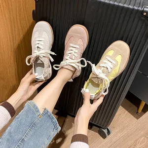 Leather ballet-style trainer sneakers in grey, pink, and tan with suede texture