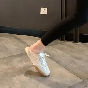 Women's cream leather ballet trainer shoes with durable gum rubber soles and flat laces
