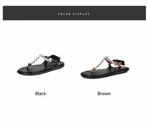 Flat thong sandals in black and brown featuring sparkling rhinestone knot straps