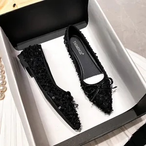 Sparkling black sequin pointed-toe ballet flats with decorative bow for women