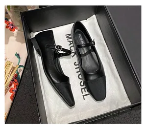 Unboxing of black square-toe Mary Jane flat shoes with texture stitch in a gift box