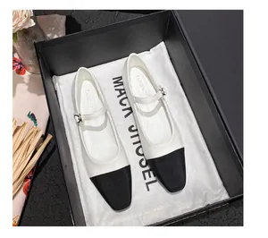 Elegant two-tone Mary Jane shoes with square toe and buckle strap in a gift box