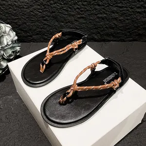 Chic women's flat sandals with braided knot thong straps for casual summer vacation style