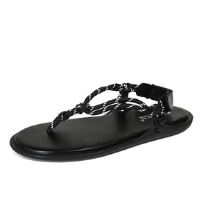 Women's black flat sandals with woven rope toe post straps and elastic ankle backstrap