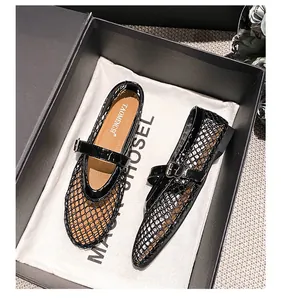 Detail shot of breathable black mesh Mary Jane flats in a premium gift box packaging