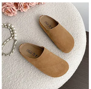 Top view of brown suede mule insoles showing softsandal logo and size markings