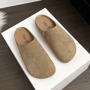 Minimalist khaki suede leather mule clogs with thick soft soles and round toe design