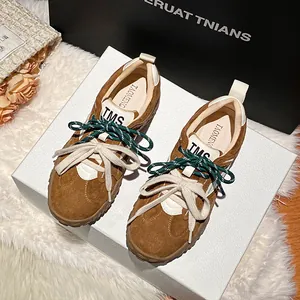 Brown suede leather platform sneakers with double laces and vintage casual design