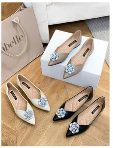Three pairs of pointed toe flat shoes with crystal flower decor in khaki beige and black