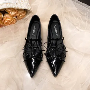 Elegant pointed toe Mary Jane flat shoes with double bow and glossy patent leather