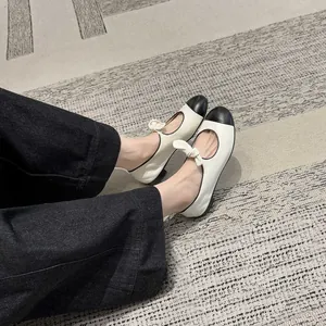 Retro bow-tie round toe Mary Jane flat shoes in sheepskin with black-white contrast