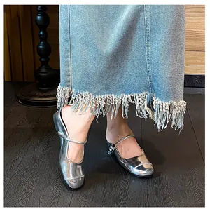 Silver mirror Mary Jane mule with buckle strap and rhinestone detailing on the round toe