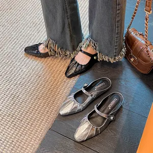 Elegant square toe pleated Mary Jane mules in metallic silver and classic black finish