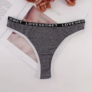 Detail of grey thong showing elastic waistband with white LOVESECRET letter print