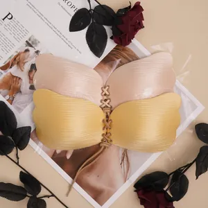 Lace-up wing-shaped invisible bra set in beige and gold with drawstring closure