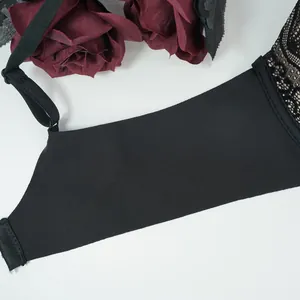 Close-up of black floral lace bra featuring seamless high-elastic side wings and straps