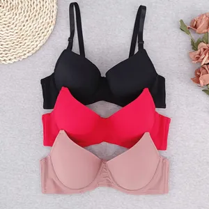 Lace-textured push-up bras in black, red, and pink with adjustable straps and underwire
