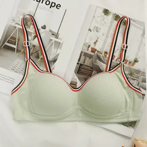 Light green ribbed wireless bra with striped elastic straps for a sporty comfort look