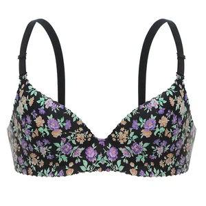 Détail d'un soutien-gorge fleuri avec bords festonnés et bretelles noires réglables