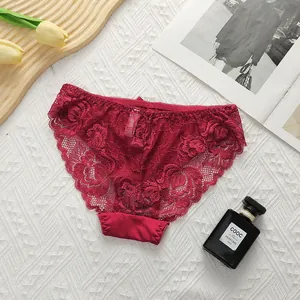 Detail of wine red floral lace panties with scallop edges and smooth cotton crotch lining