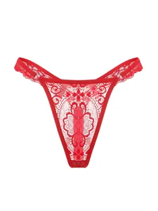 Detailed view of red lace thong featuring intricate floral patterns and metal ring connectors