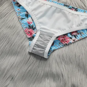 Detailed view of women's floral panties featuring soft cotton crotch and lace trim edges