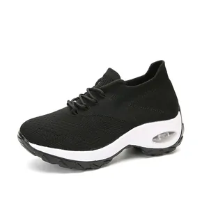 Damen-Sneaker aus atmungsaktivem Mesh mit Luftkissen und Strickgewebe in Schwarz und Weiß