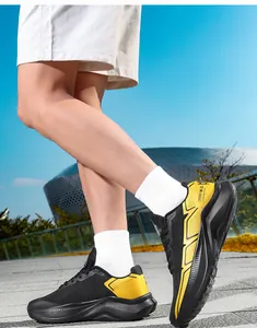 Detailed outdoor shot of men's breathable trekking shoes with thick rubber soles