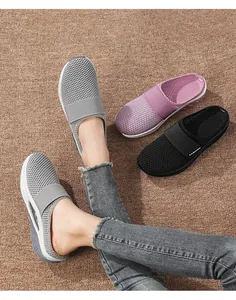 Detailed view of breathable mesh mule sandals in grey, purple, and black with thick soles