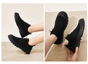 Close-up of black breathable mesh walking shoes with durable rubber anti-slip soles