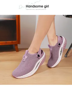 Detail view of purple mesh breathable clogs with air cushion soles and adjustable straps