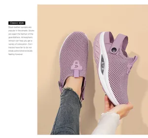 Detail of purple mesh sandals featuring a visible air cushion unit for comfort