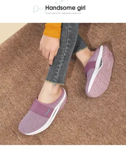 Detail of purple mesh platform mule featuring fashion elastic strap and air cushion sole