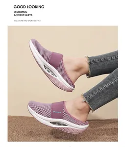 Detailed side view of purple platform mule with mesh upper and visible air cushion