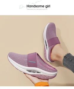 Detail of purple breathable mesh mule sneakers with cushioned air sole and fashion logo