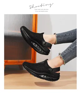Detail of black mesh mule sandals with visible transparent air cushion sole for women