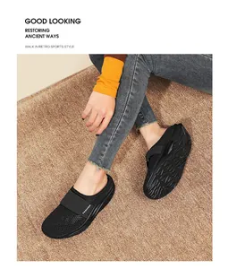 Close-up of black breathable mesh walking shoes with fashion strap and platform sole
