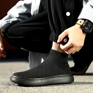 Black knit sock sneakers for men featuring breathable fabric and thick rubber soles